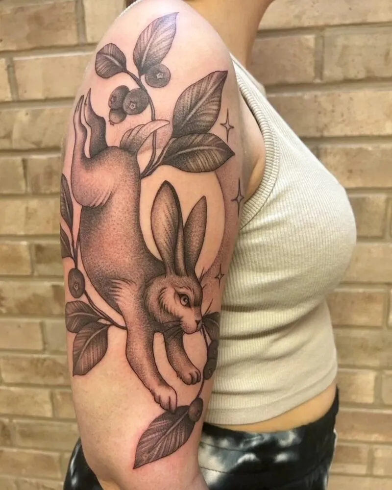 Kuvitustatuointi - jänis mustikoilla